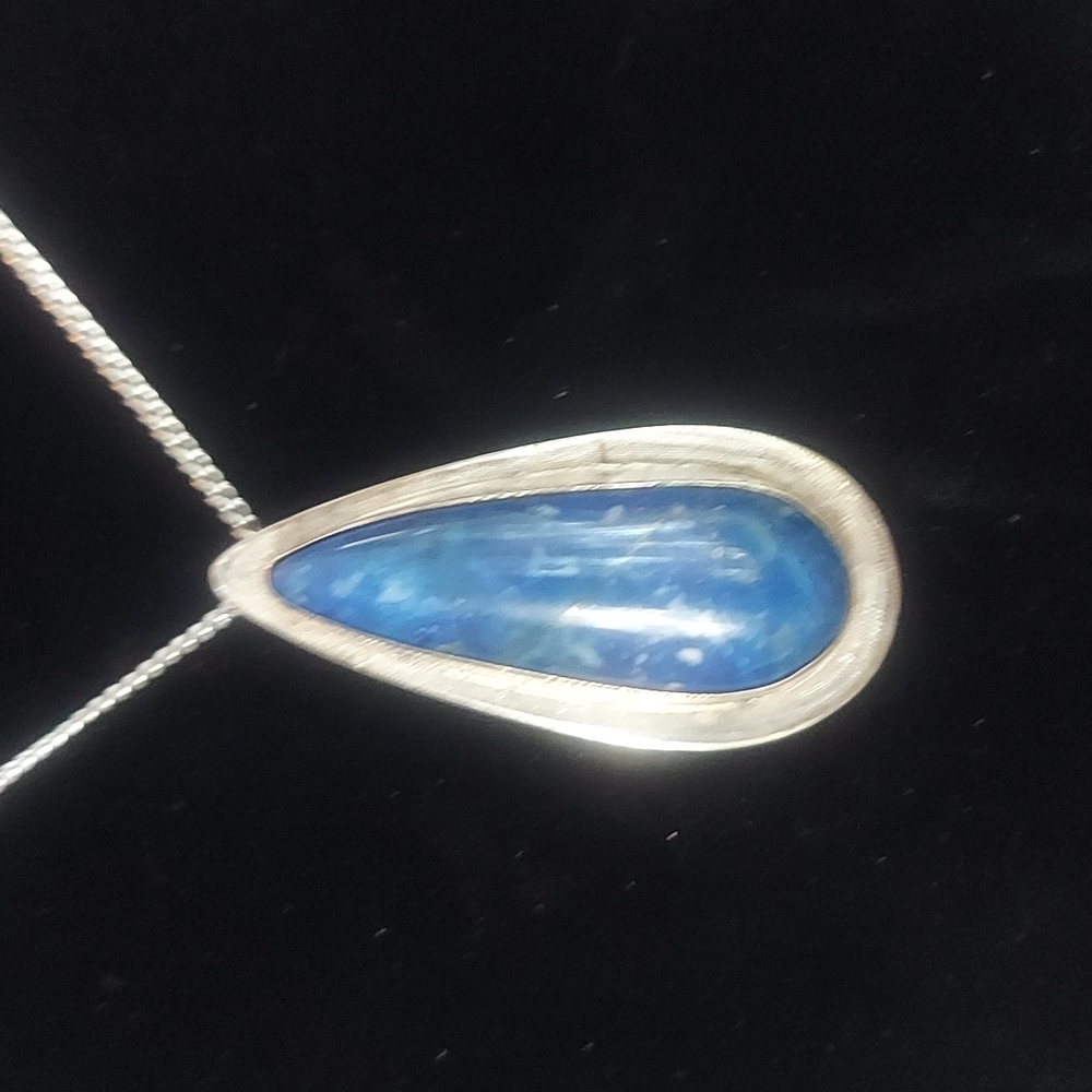 Sterling silver & genuine lapis pendant.